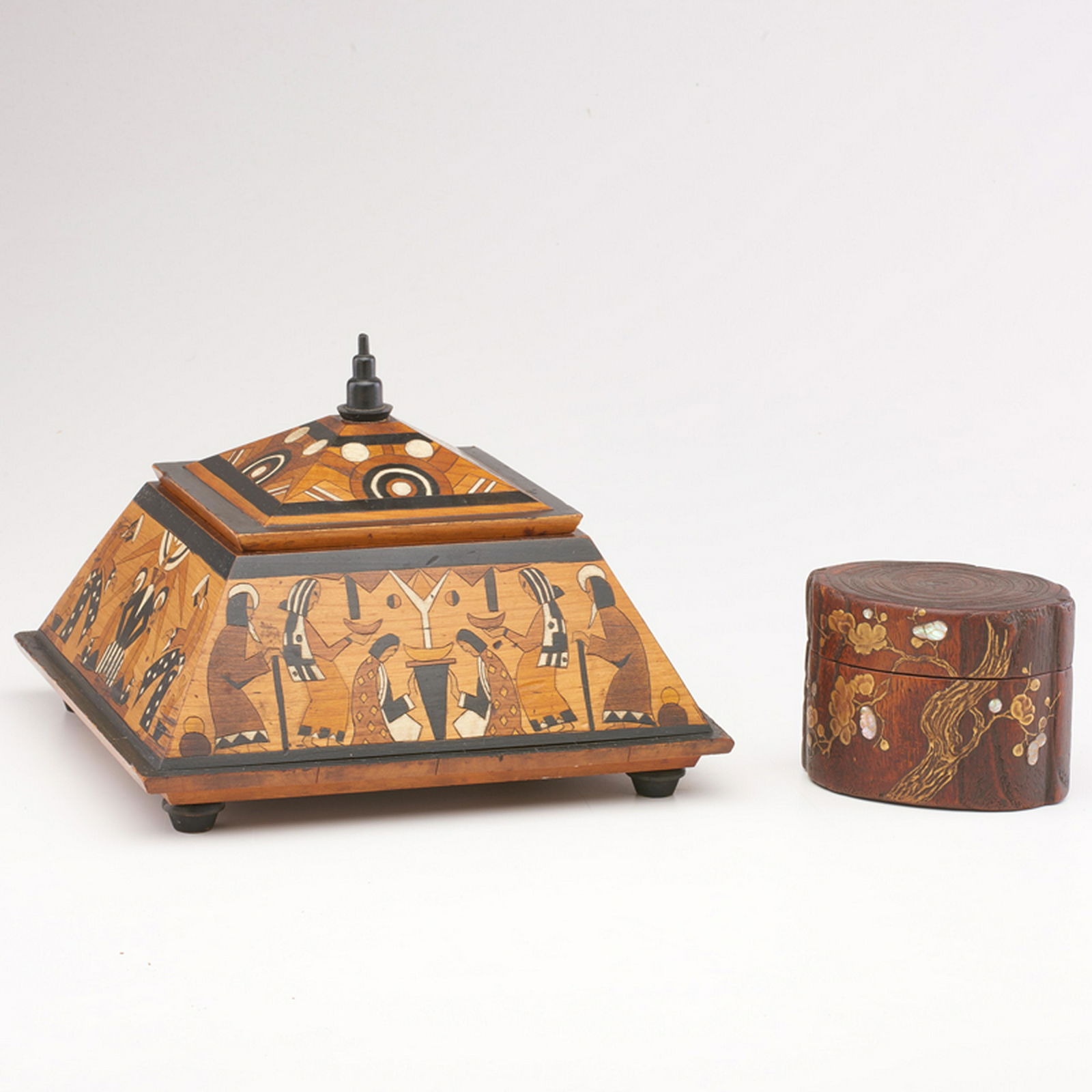 CONTINENTAL: Two decorative boxes: pyramidal with Middle-Eastern motif, and japanesque with gilt cherry blossom tree, grass with insect, and mother-of-pearl appliques Carved, stained and gilt wood Pyramidal box: w