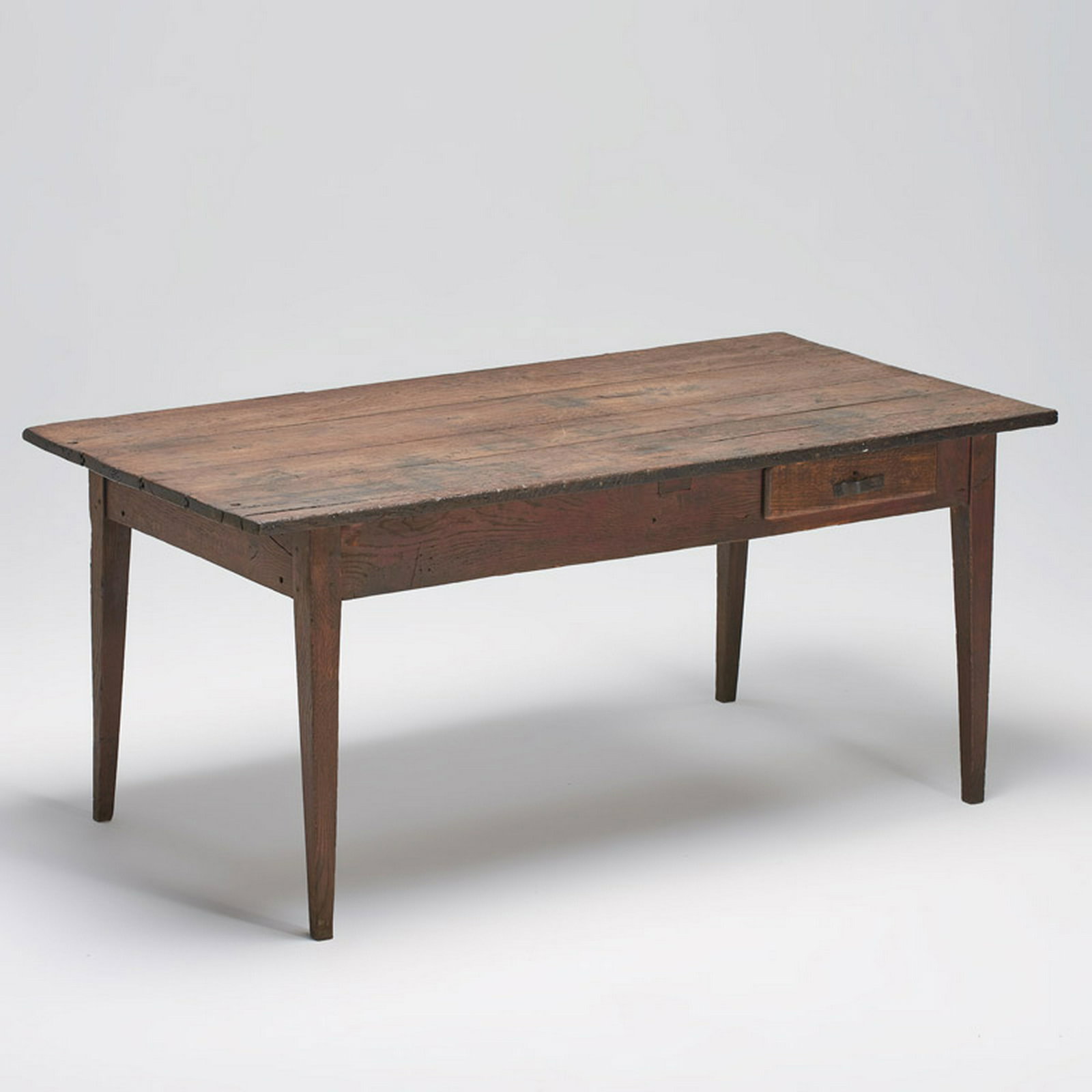 FRENCH: Two-drawer farm table, 19th c. Oak, iron Unmarked 28 1/2" x 65" x 32"