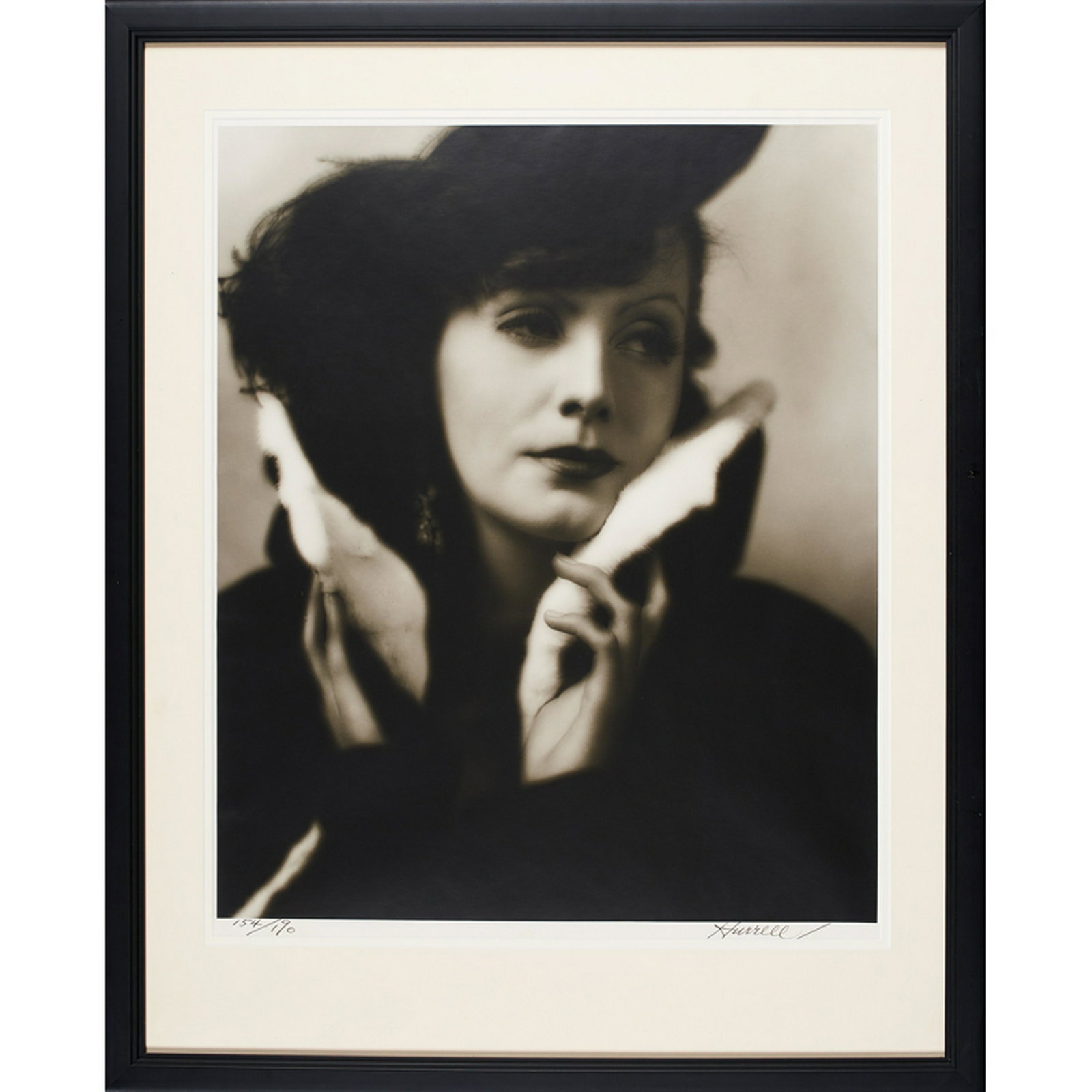 GEORGE HURRELL (American, 1904-1992): Three gelatin silver prints "Greta Garbo," 1930, "Humphrey Bogart" and "Charles Boyer," 1938 (all framed separately) Each signed and numbered Largest: 24" x 19 1/2" (sight) Smallest: 13 1/2" x 10 1/2"