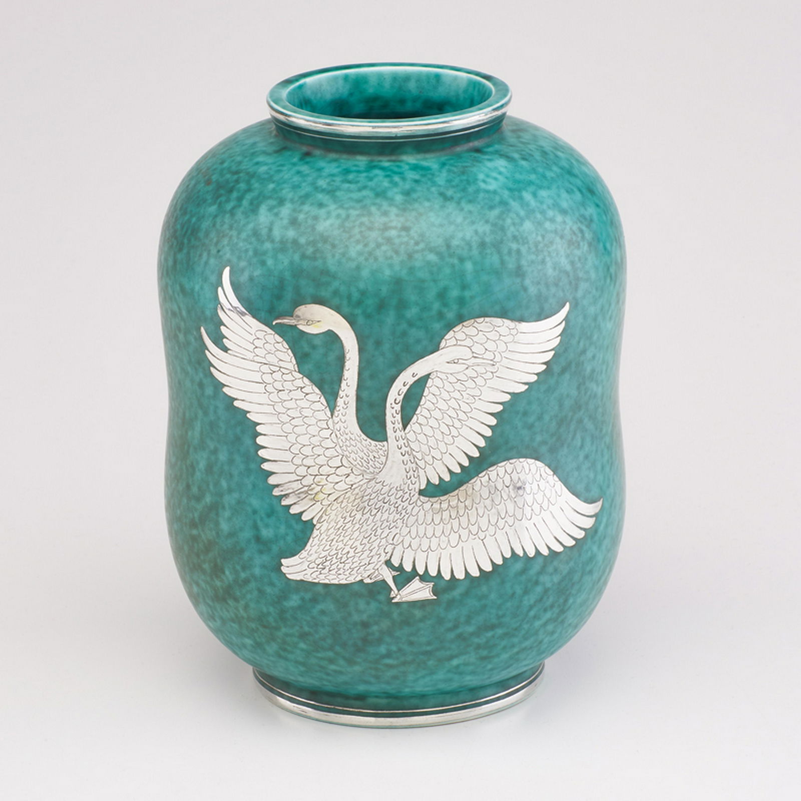 WILHELM KAGE (1889 - 1960); GUSTAVSBERG: Gourd shaped Argenta vase, decorated with nude figure and swans, Sweden, 1935 Glazed stoneware, electroplated silver Marked HANDDREJAD/ARGENTA 1079 III/GUSTAVSBERG/KAGE 7 1/2" x 5 1/2" dia.