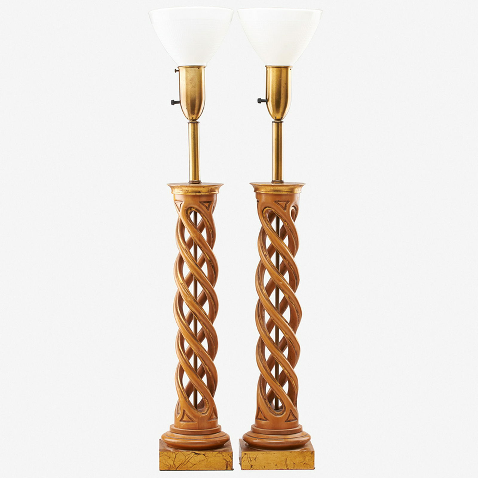 JAMES MONT; FREDERICK COOPER: Pair of carved helix table lamps, USA, ca. 1950s-70s Bleached, and gilt mahogany, brass, milk glass Unmarked As shown: 42 1/2" x 6 3/4" sq.