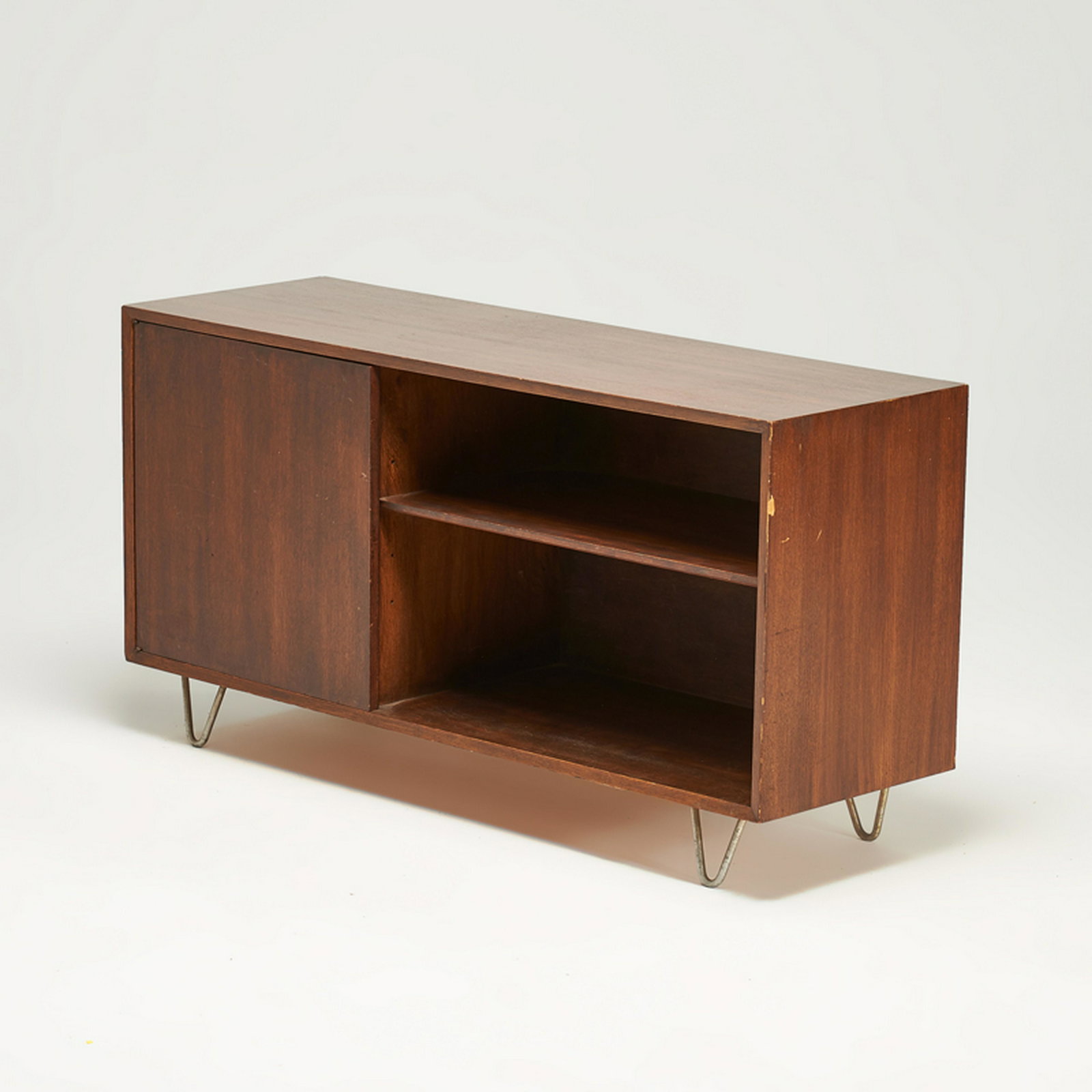 GEORGE NELSON; HERMAN MILLER: Cabinet, Grand Rapids, MI, mid-20th c. Oak, aluminum Unmarked 29 1/2" x 56" x 18 1/2"