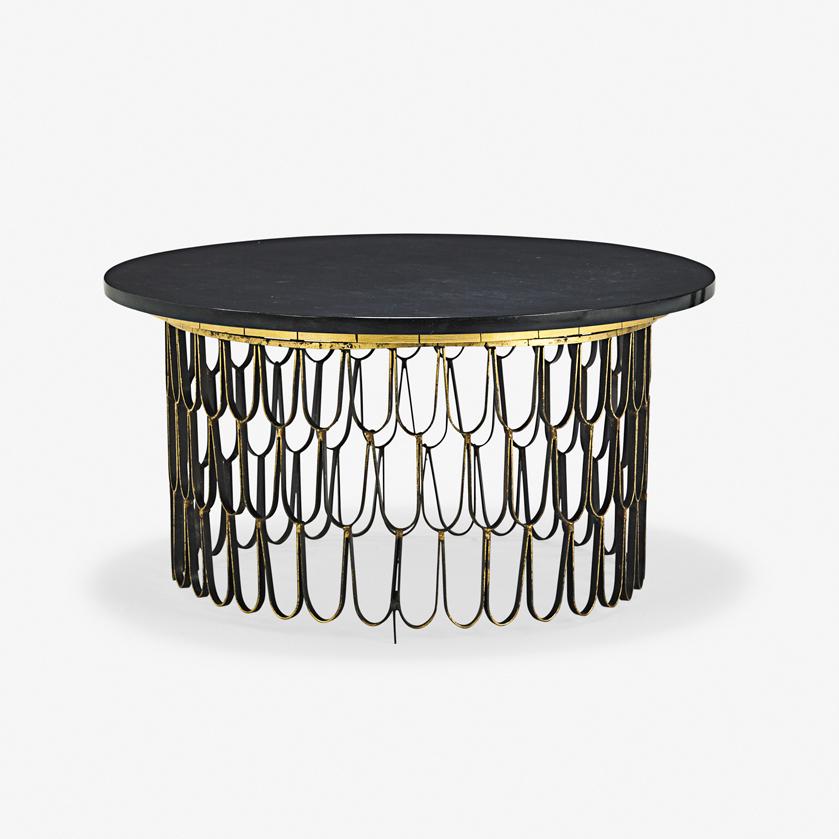 PAUL EVANS Loop coffee table: PAUL EVANS (1931 - 1987) PAUL EVANS STUDIO Loop coffee table, New Hope, PA, early 1960s Patinated iron, wood, 24k gold, cleft slate Unmarked 19" x 36" dia. Provenance: Original owner, purchased from t