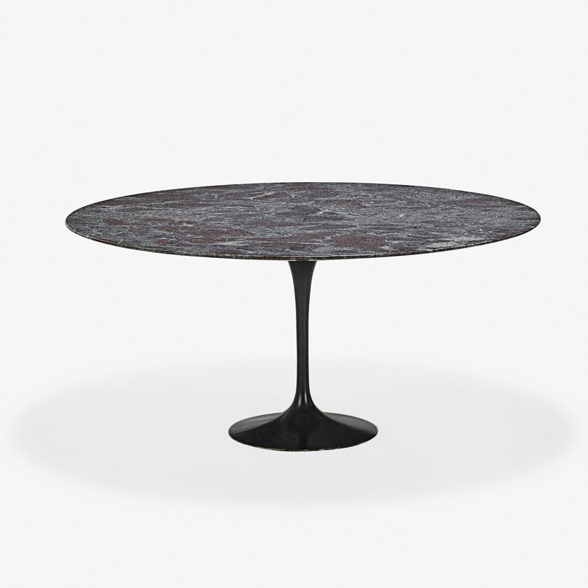 EERO SAARINEN KNOLL Tulip dining table: EERO SAARINEN (1910 - 1961) KNOLL Tulip dining table, Italy/USA, mid-20th C. Enameled cast iron and wood, granite Unmarked 29" x 62" dia.