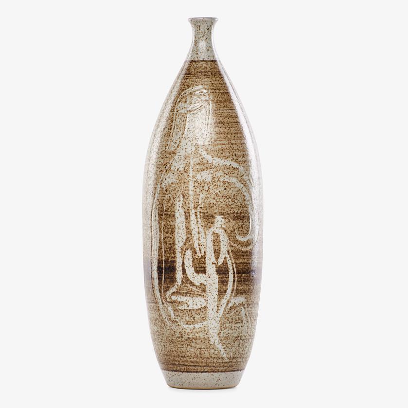 A. BOHROD; C. BALL Tall vase: AARON BOHROD (1907 - 1992) CARLTON BALL (1911 - 1992) Tall bottled-shaped vase with abstract nudes, Wisconsin, mid-20th C. Glazed and incised stoneware Signed 16" x 5"