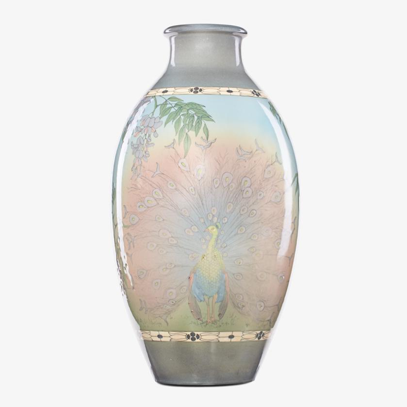 SARA SAX; ROOKWOOD Massive Jewel Porcelain vase: SARA SAX (1870 - 1949) ROOKWOOD Massive Ivory Jewel Porcelain vase with peacock, bird of paradise, and wisteria, Cincinnati, OH, 1919 Flame mark/XIX/2370/SX/seconded mark 20 3/4" x 10 1/2"