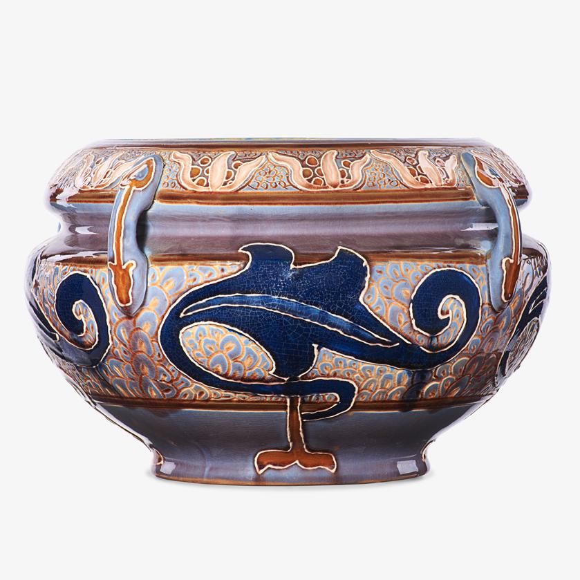 F.H. RHEAD; VANCE/AVON Jardinière: FREDERICK H. RHEAD (1880 - 1942) VANCE/AVON Jardinière with stylized flowers and acanthus leaves, Tiltonville, OH, 1902-03 Signed Rhead to body, base incised AVON 1903 F.H. 1005 7 3/4" x 12" dia. Pub