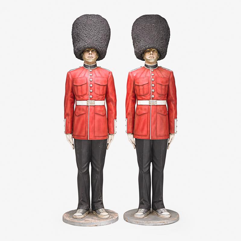 PAIR OF BRITISH ROYAL GUARD STANDING FIGURES: Painted plaster and wood, 20th c 84" Provenance: Previously used in Ralph Lauren store display