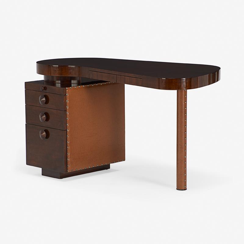 GILBERT ROHDE FOR HERMAN MILLER PALDAO DESK: Model 4106, vinyl, brass, single pedestal desk, Zeeland, MI, mid 20th c. Unmarked 29 1/2" x 52" x 31"