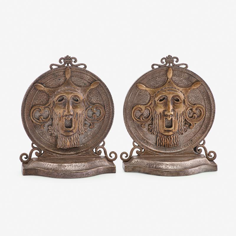 PAIR OF OSCAR BACH BOOKENDS: Copper plated bronze and copper plated zinc alloy, USA, ca. 1922 Signed and impressed 8 1/2" x 7" x 3"