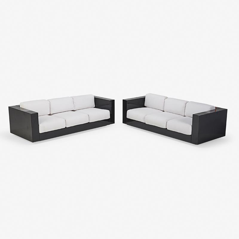 PAIR OF MASSIMO VIGNELLI SOFAS: Enameled wood, upholstery, Italy, mid-20th c. Unmarked 27" x 83" x 38"
