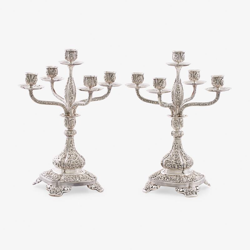 PAIR OF TIFFANY & CO. STERLING SILVER CANDELABRA: Each detachable five-light branches with chased floral decoration, USA, 1922-47 Marked "20108/9812" 14 1/2" x 11 1/2", 134 ozt (total weight) Provenance: L'Antiquaire, Palm Beach, 13 August 1988 Prope