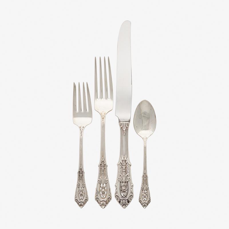 WALLACE STERLING SILVER FLATWARE SERVICE: Eighty-nine: Rose Point pattern, (11) dinner forks, (12) dinner knives (hollow handle), (23) teaspoons, (12) salad forks, (12) cream soup spoons, (12) butter knives (hollow handle), (1) preserves spoo