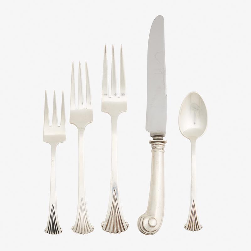 TUTTLE STERLING SILVER FLATWARE: Sixty-four: Onslow pattern, (12) dinner forks, (12) lunch forks, (12) pastry forks, (12) dinner knives (hollow handle), (11) teaspoons, (1) serving fork, (1) serving spoon, (1) sauce ladle, (1) vegeta