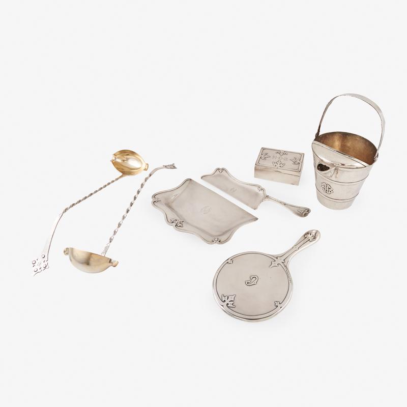 SHREVE & CO. STERLING SILVER: Seven: Fourteenth Century pattern, includes (1) cocktail/ice bucket, (2) punch ladles, (1) tobacco box, (1) hand mirror, (1) crumber, and (1) dust pan, San Francisco, CA, early 20th c. Marked Bucket: