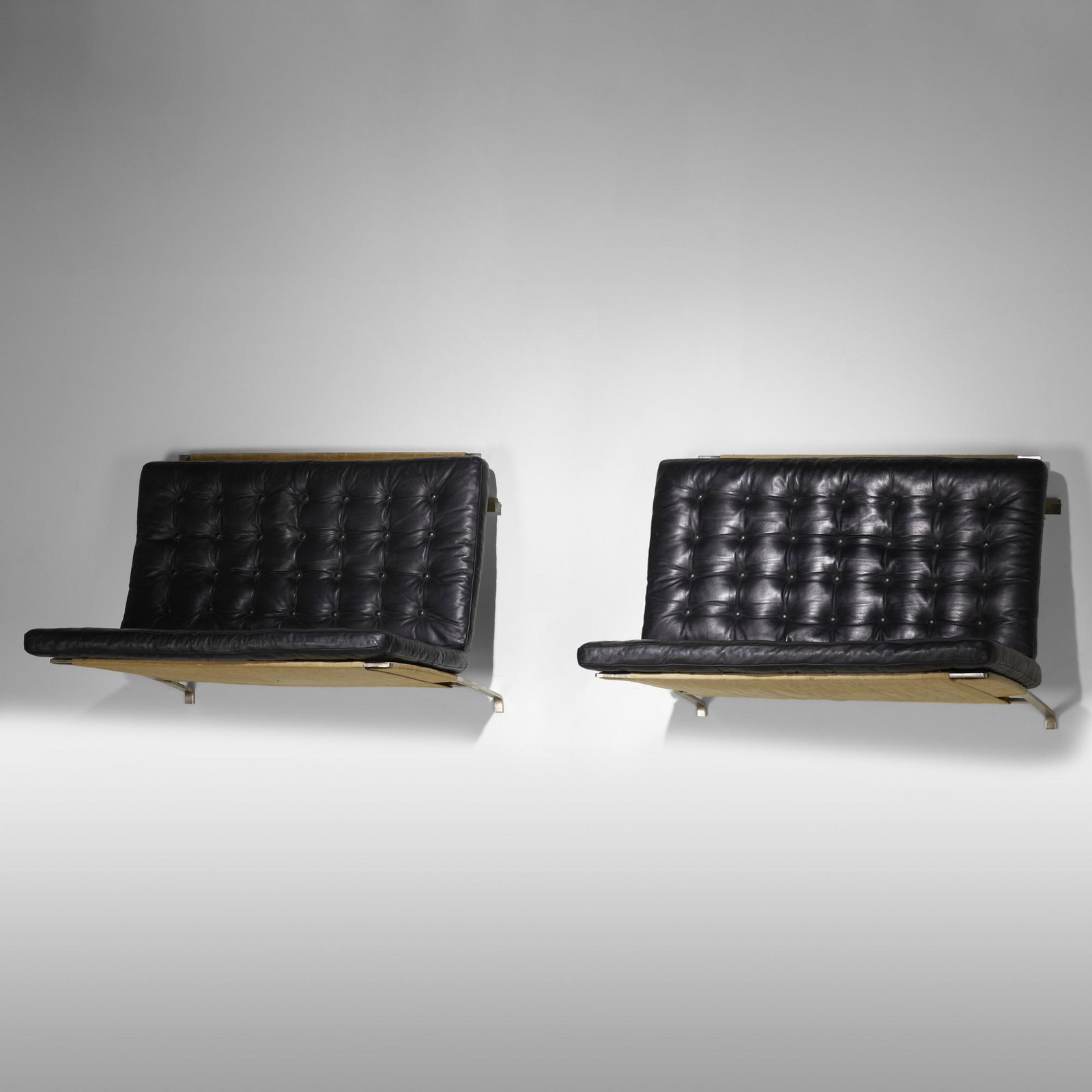 Poul Kjaerholm, wall-mounted settees model PK 26, pair: Poul Kjaerholm wall-mounted settees model PK 26, pair E. Kold Christensen Denmark, 1956 matte chrome-plated steel, string, canvas, leather 26.5 h × 37.25 w × 29.25 d in (67 × 95 &ti