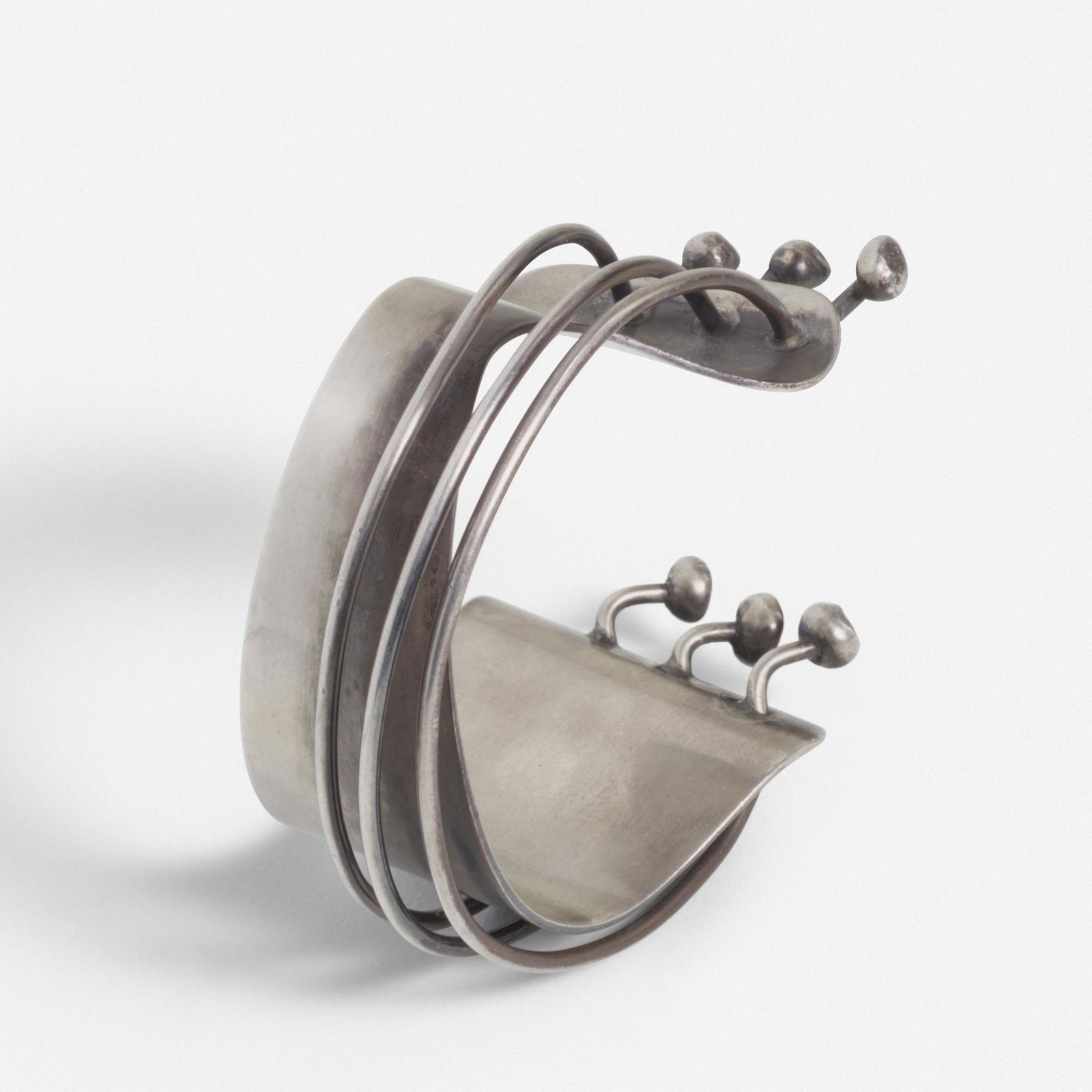 Ed Wiener, bracelet: Ed Wiener bracelet USA, c. 1950sterling silver3 h × 2.75 w × 1.75 d in (8 × 7 × 4 cm) Signed to interior 'Ed Wiener Sterling'.