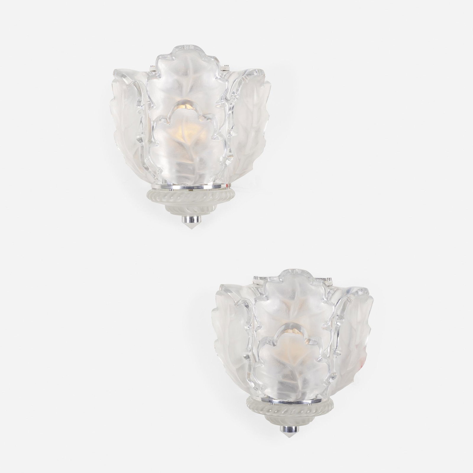 Lalique, Chêne sconces, pair: Lalique Chêne sconces, pair France, after 1978 frosted and clear glass, chrome-plated metal 10.5 h × 9.5 w × 6.5 d in (27 × 24 × 17 cm) Etched signature to underside and to