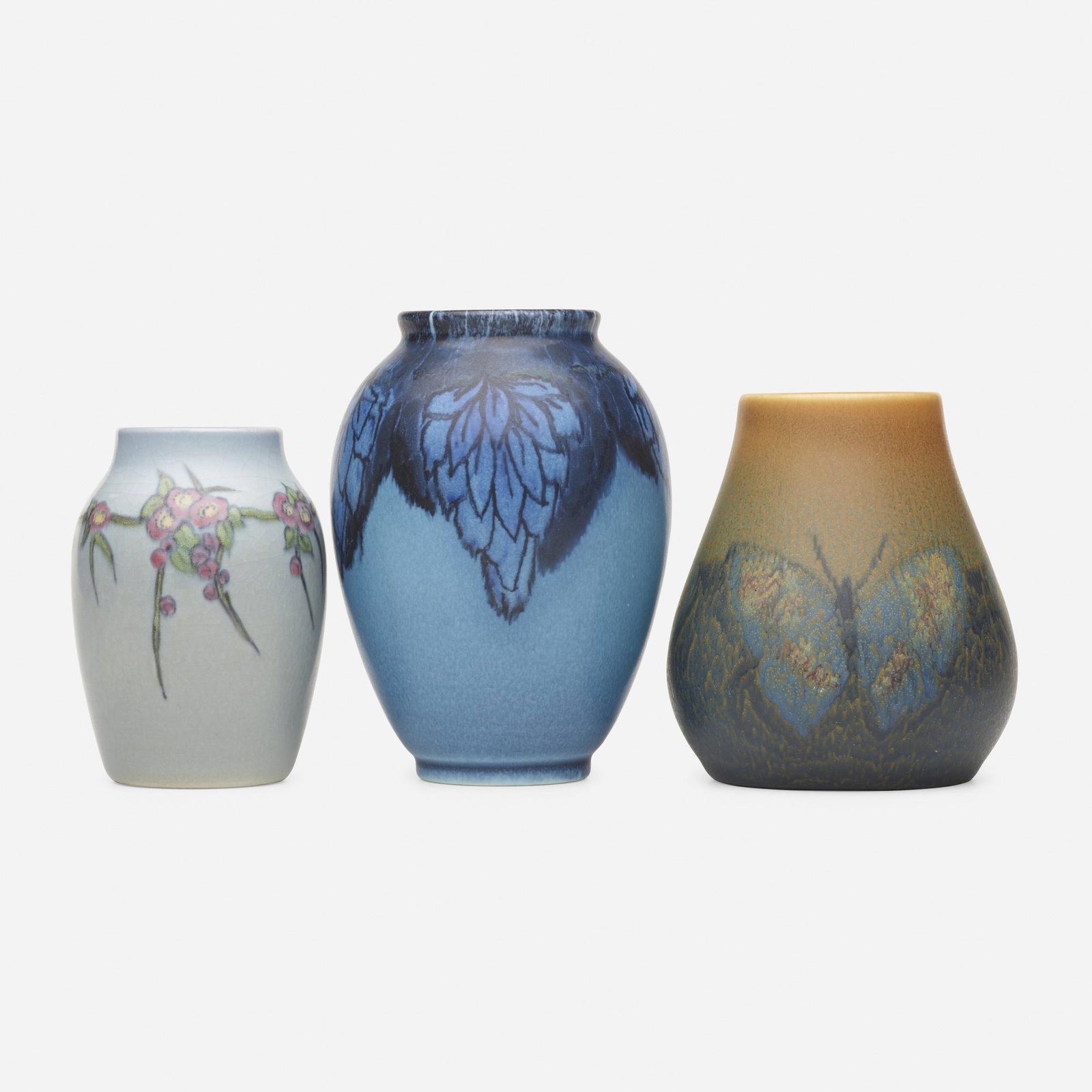 Rookwood Pottery, Double Vellum vases, set of three: Rookwood Pottery Double Vellum vases, set of three USA, 1921-24 glazed porcelain Lot is comprised of Vera Tischler vase with flowers measuring 3 dia x 4 h, Elizabeth Barrett vase with hops measuring 3