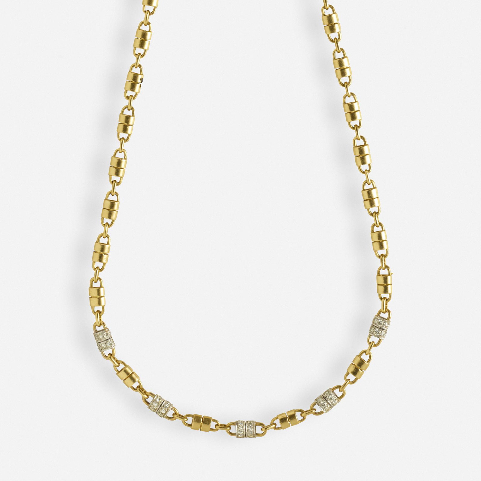 Van Cleef & Arpels, Diamond and gold sautoir necklace: Van Cleef & Arpels Diamond and gold sautoir necklace Designed as gold barrel links, five with platinum and round brilliant-cut diamond accents 18k yellow gold and platinum Signed VCA 23 ins; Gross