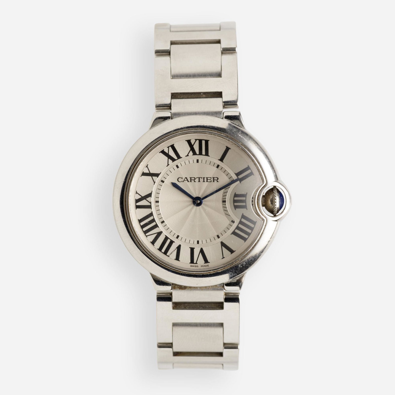 Cartier, 'Ballon Bleu' 36mm wristwatch: Cartier 'Ballon Bleu' 36mm wristwatch The 'Ballon Bleu', first designed in 2007, uniquely houses the wind stem disturbing the traditional round dial and case. In addition, the smooth bubble front and 
