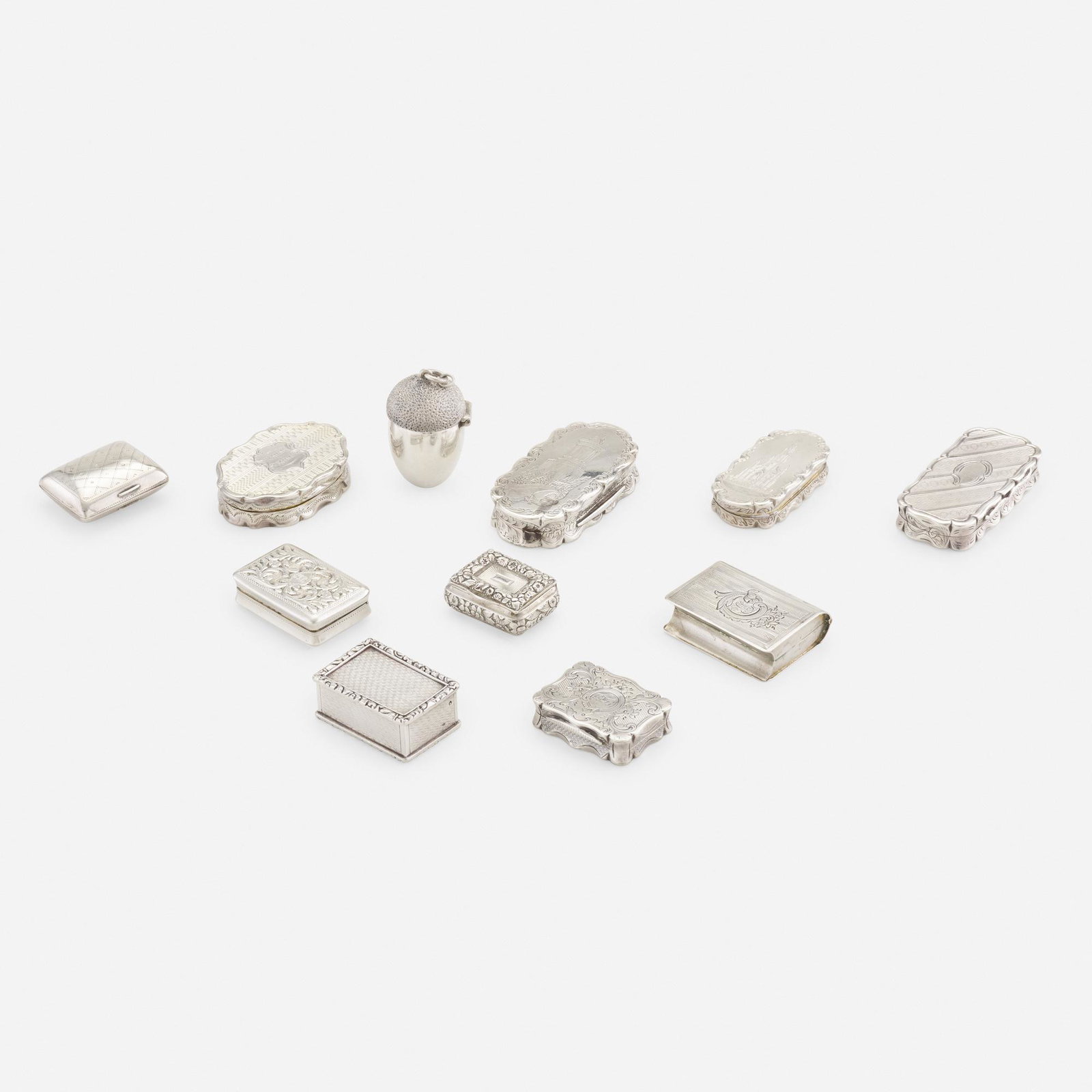 Georgian and Victorian, vinaigrettes: Georgian and Victorian vinaigrettes, collection of eleven 19th century sterling silver 2 h × 1 w in (5 × 3 cm) Engraved with trellis pattern by Sm. Pemberton (Birmingham, 1803) Shap