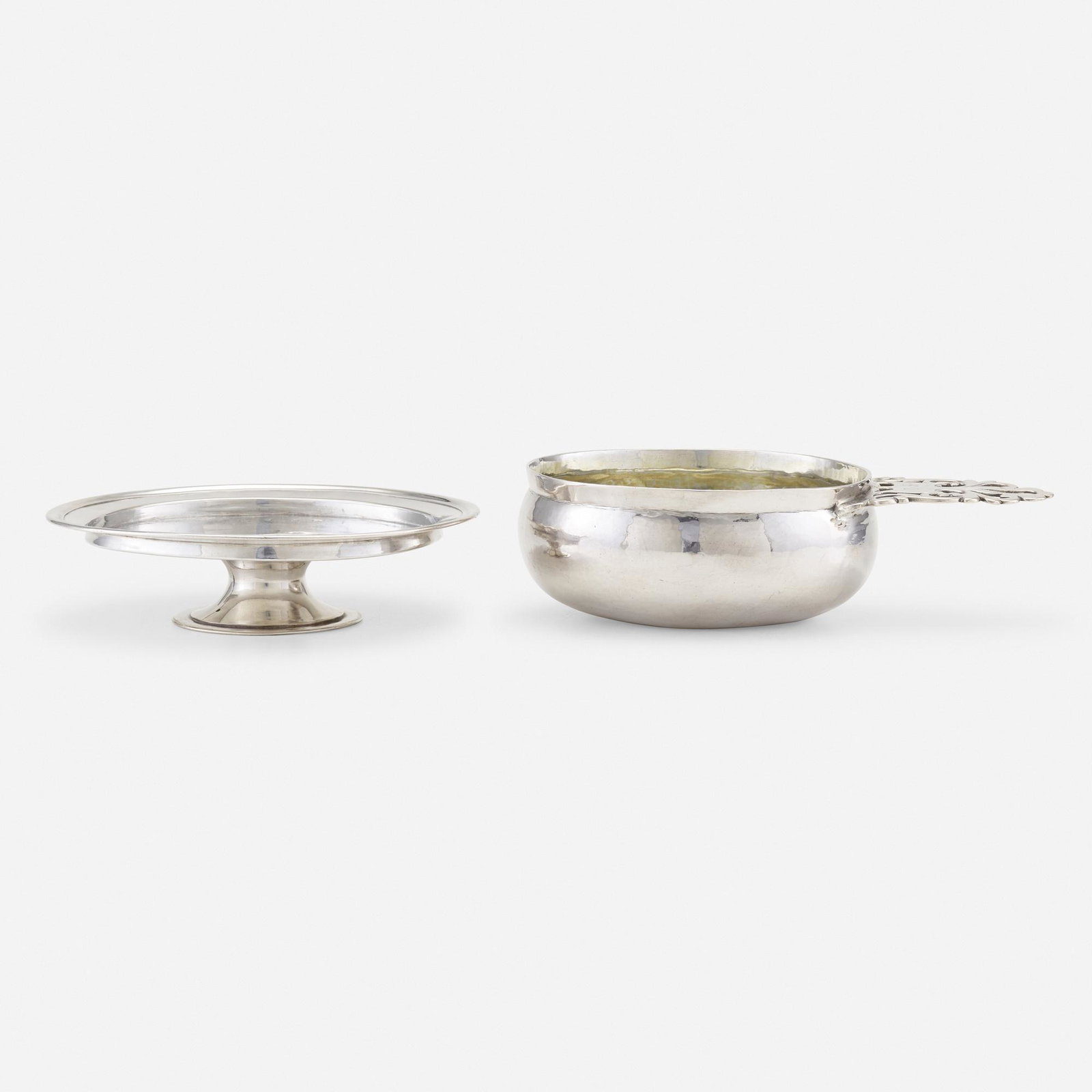 George I, tazza and porringer: George I tazza and porringer 1716-24 Britannia standard silver 2.25 h × 8 w × 5.5 d in (6 × 20 × 14 cm) Tazza with engraved lozenge-of-arms to underside by John White, 1724.