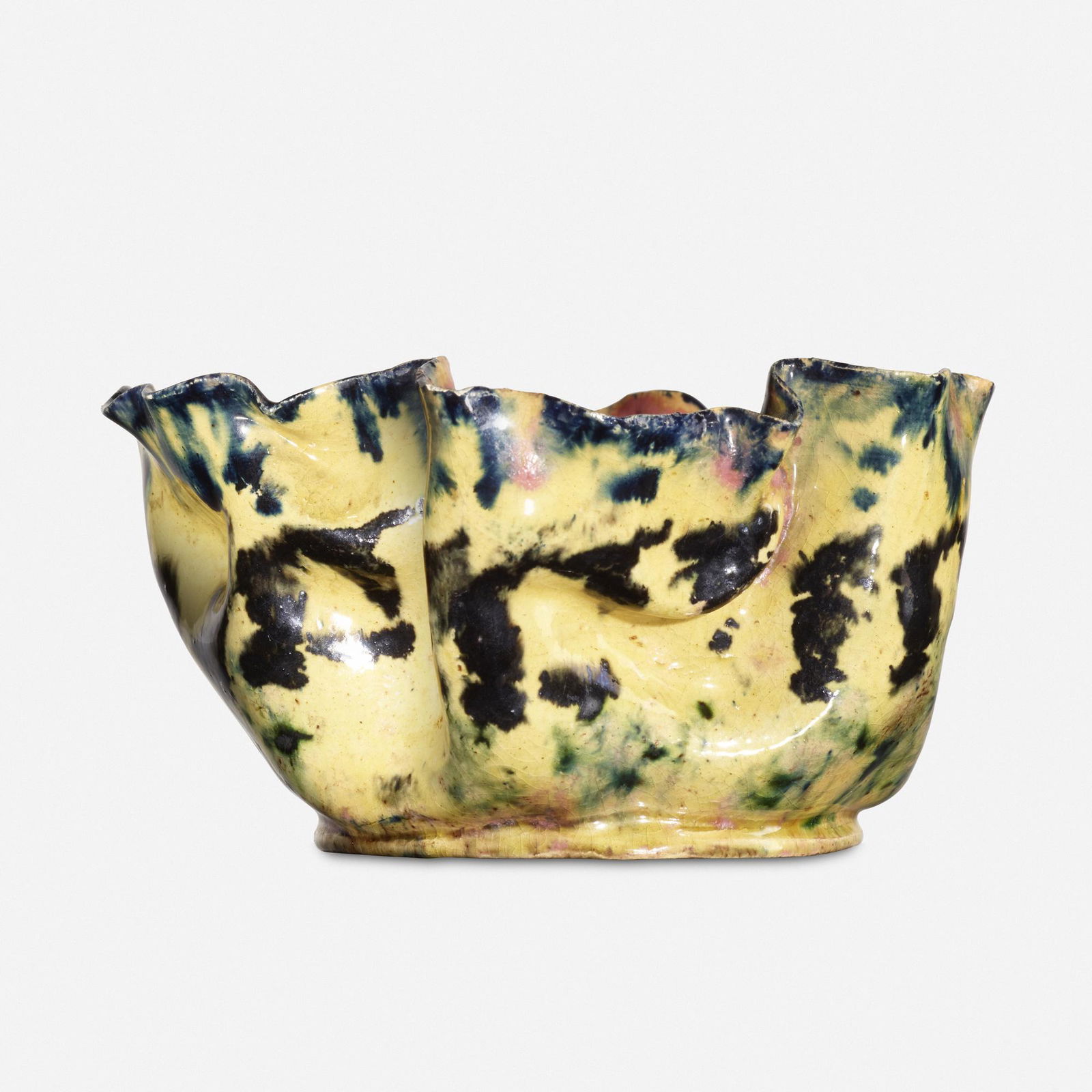 George E. Ohr, vase: George E. Ohr vase USA, 1899glazed earthenware2.5 h × 4.5 dia in (6 × 11 cm) This work features a ruffled rim, dimples, and pinches to body with sponged-on mauve, blue, black, and green glazes ov