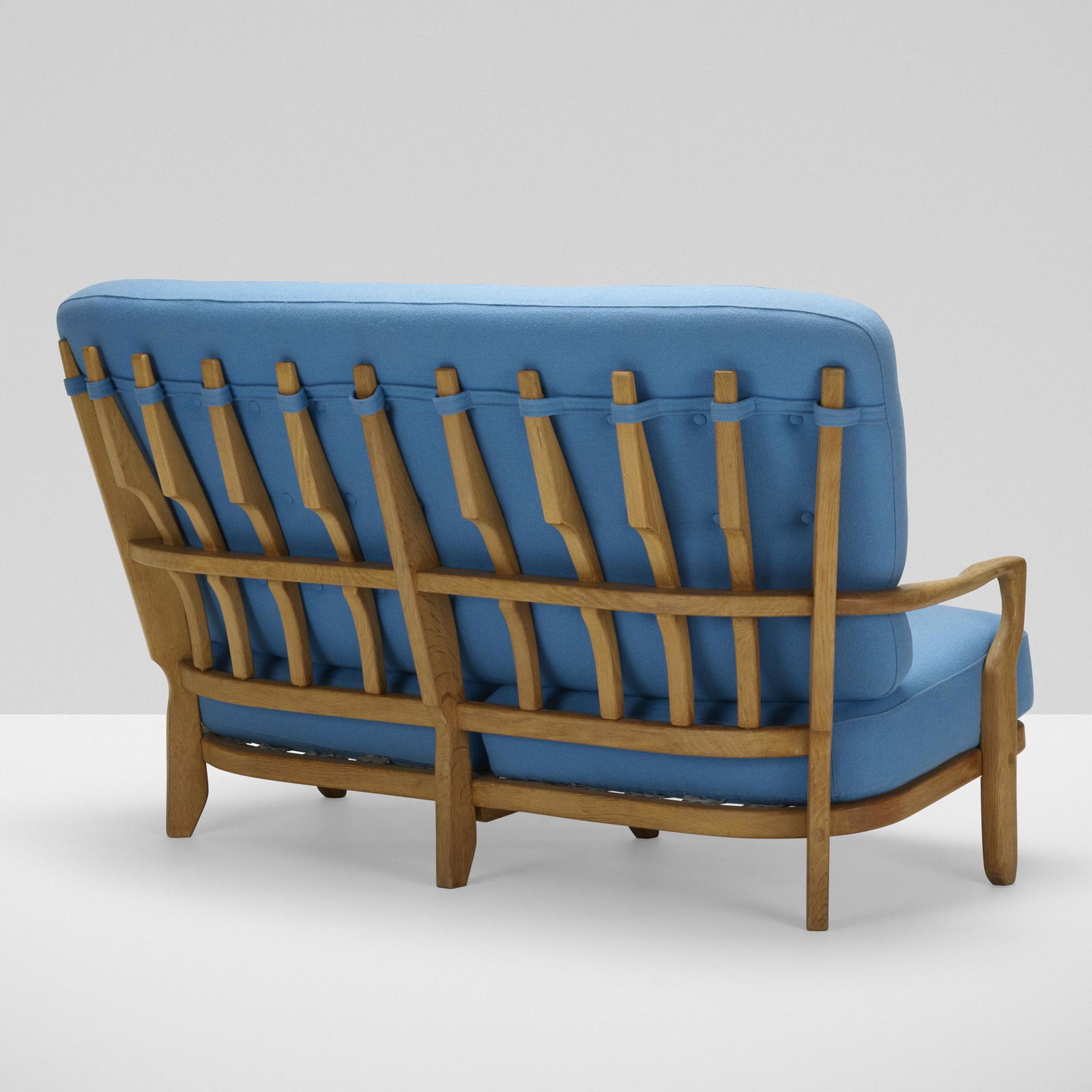 Robert Guillerme and Jacques Chambron, settee: Robert Guillerme and Jacques Chambron settee Votre MaisonFrance, c. 1960oak, upholstery38 h × 64 w × 40 d in (97 × 163 × 102 cm) Literature: Mobi