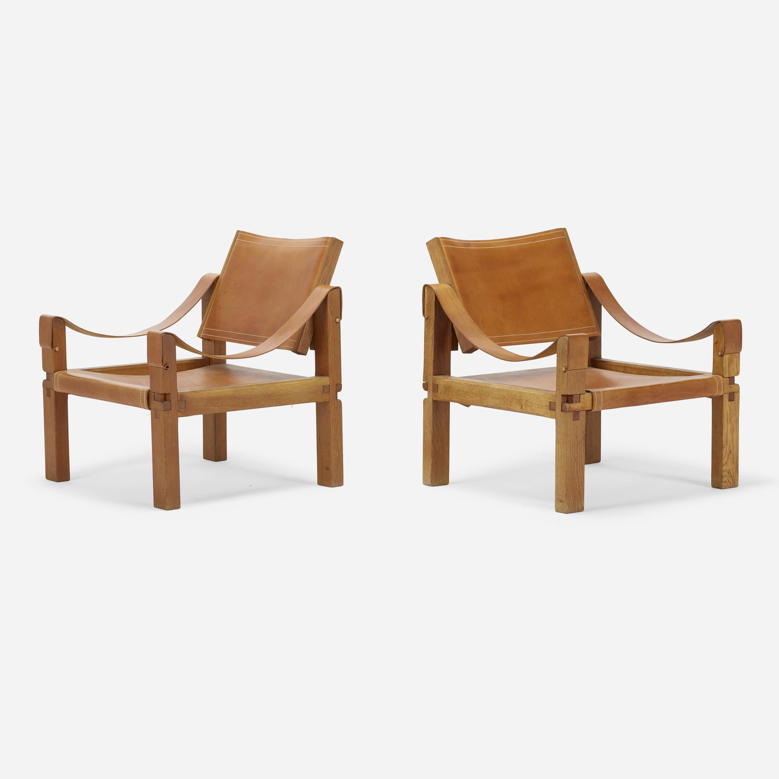 Pierre Chapo, Sahara lounge chairs, pair: Pierre Chapo Sahara lounge chairs, pair France, c. 1965 elm, stitched saddle leather 29 h × 26 w × 27 d in (74 × 66 × 69 cm) please note: this work is located a