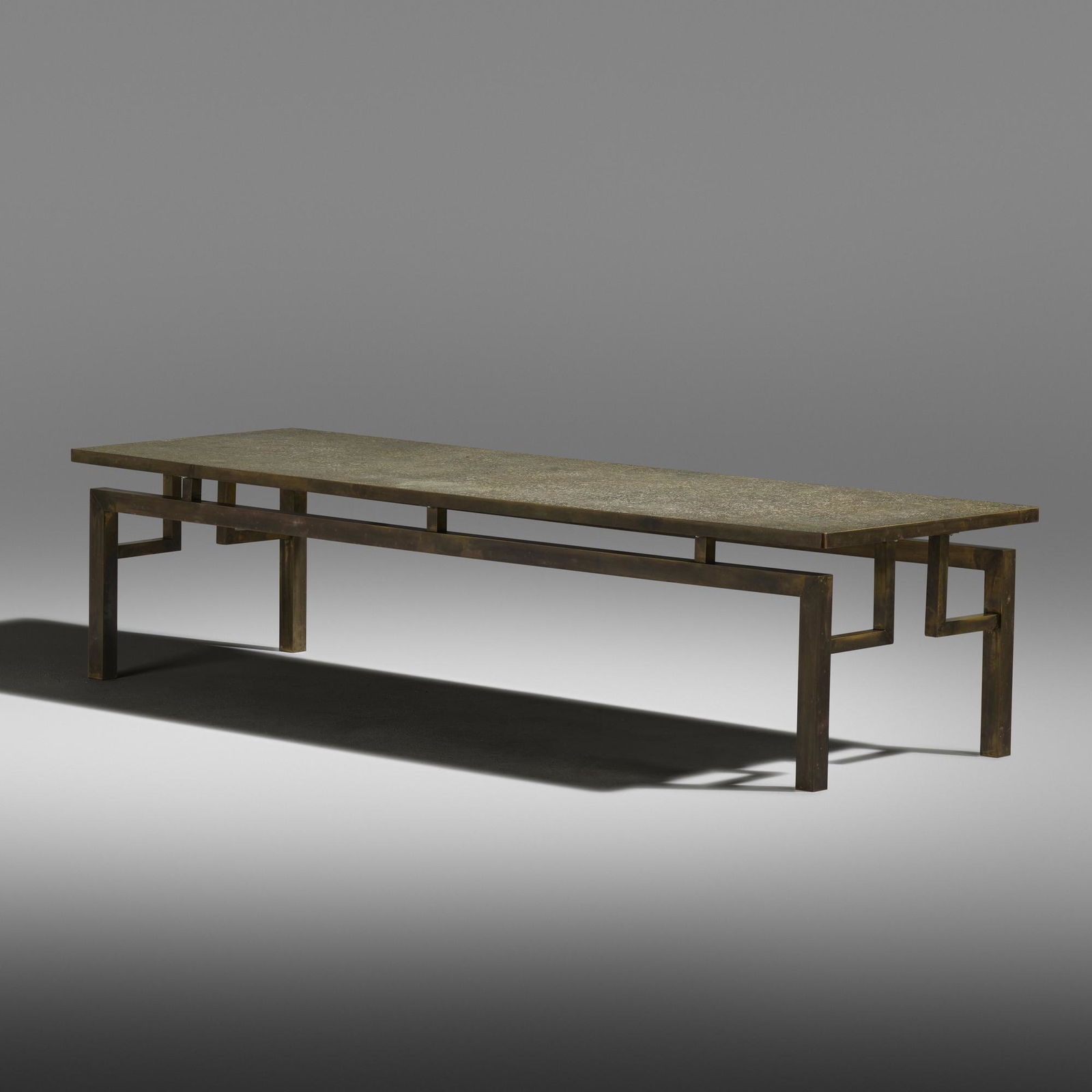 Philip and Kelvin LaVerne, Etruscan coffee table: Philip and Kelvin LaVerne Etruscan coffee table USA, c. 1965acid-etched and patinated brass over pewter and wood16.75 h × 69.75 w × 23.75 d in (43 × 177 × 60 cm) Etched si
