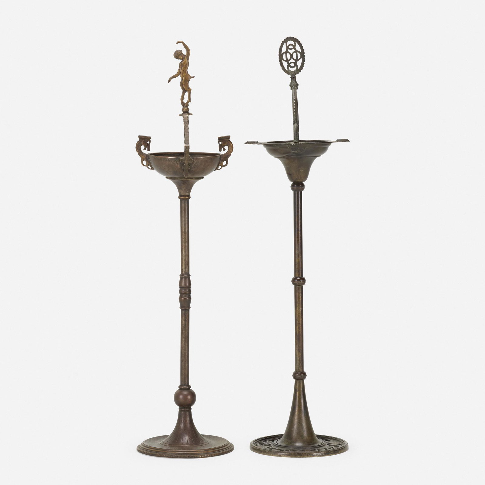 Oscar Bach, smoking stands, set of two: Oscar Bach smoking stands, set of two USA, c. 1925 patinated metal, copper 40.5 h × 9.75 dia in (103 × 25 cm) Additional example measures: 9.5 dia x 40 h inches. Metal manufacturer's la