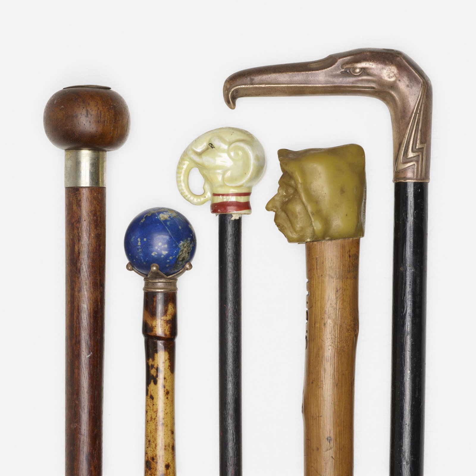 Continental, walking sticks, collection of five: Continental walking sticks, collection of five 20th century silvered metal, rosewood, Bakelite, aluminum, bamboo, stone, glazed ceramic, stained and lacquered wood 37 h × 2 dia in (94 × 5 
