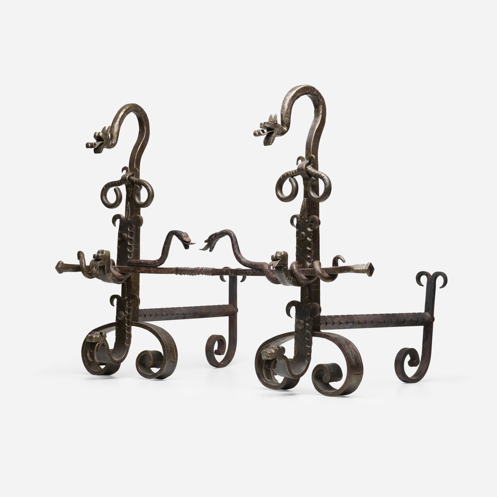 In the manner of Samuel Yellin, andirons, pair: In the manner of Samuel Yellin andirons, pair USA, early 20th century wrought iron 24.75 h × 34 w × 19.5 d in (63 × 86 × 50 cm) Andirons feature a log-rest entwined with ser