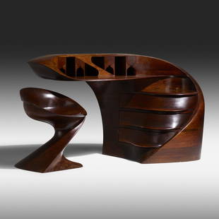 Michael Coffey, Early El Morro desk and chair: Michael Coffey Early El Morro desk and chair USA, 1973laminated and carved African mozambique38.5 h × 64 w × 33 d in (98 × 163 × 84 cm) Chair measures: 22 dia x 26.75 h in