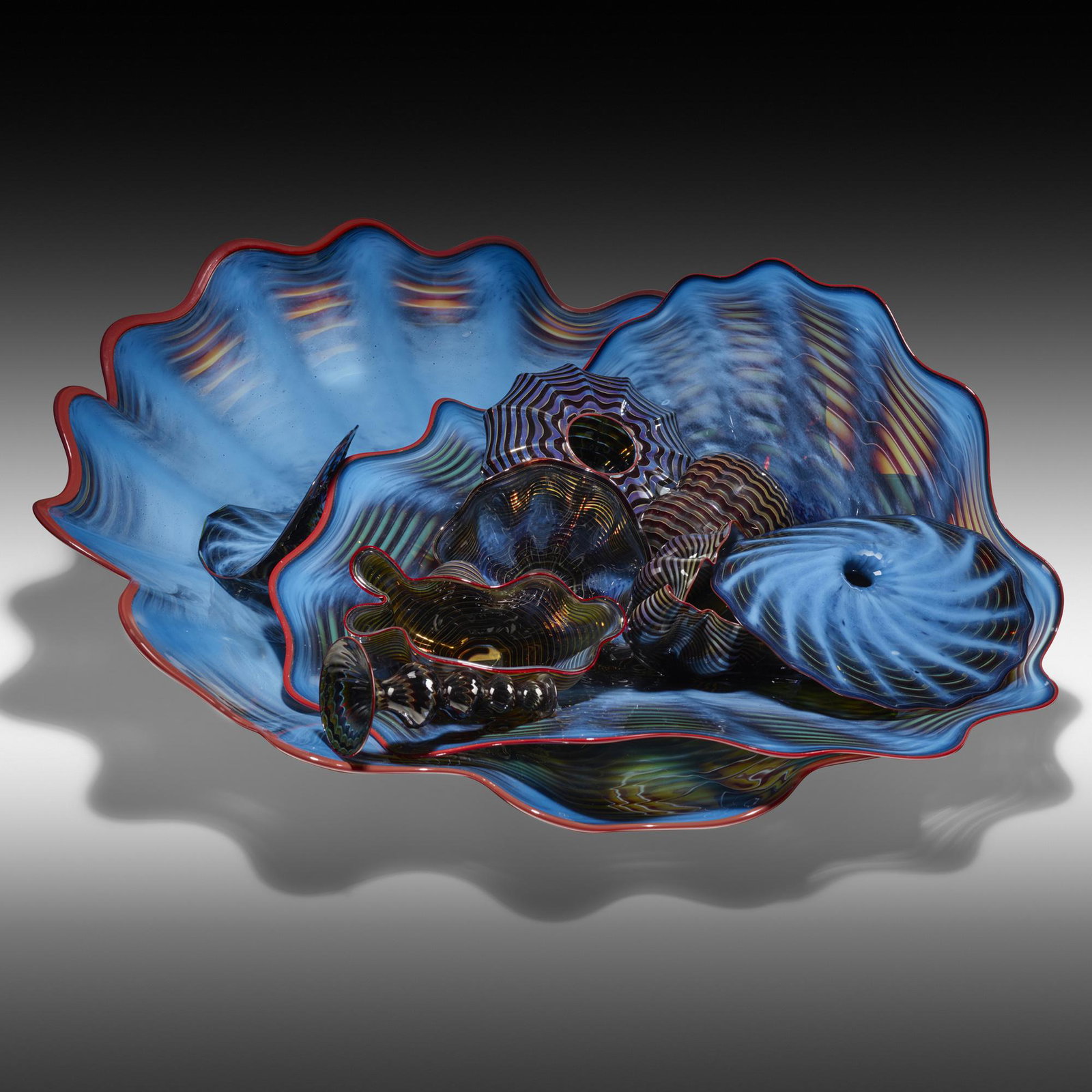 Dale Chihuly, Persian and Seaform group: Dale Chihuly Persian and Seaform group USA, 1990 hand-blown glass 6.5 h × 24.5 w × 23 d in (17 × 62 × 58 cm) This group is composed of ten possibly assembled Persian and Sea