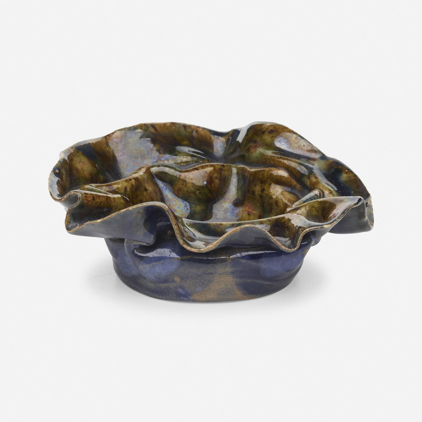 George E. Ohr, Small dish: George E. Ohr Small dish USA, 1895-96glazed earthenware1.5 h × 3.75 w × 3.5 d in (4 × 10 × 9 cm) Dish features a ruffled rim and blue, ochre, raspberry and green glazes wi