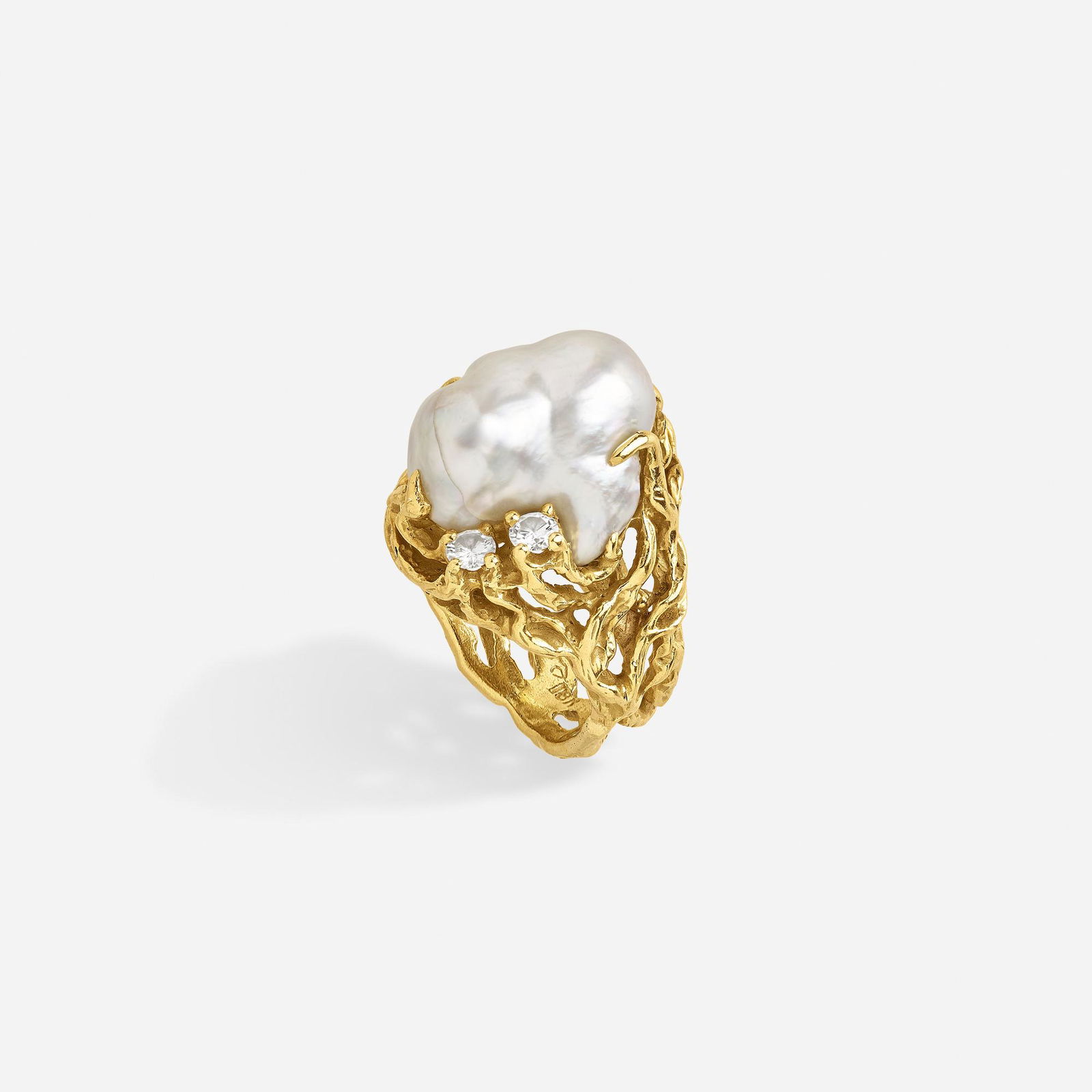 Arthur King, Baroque cultured pearl and diamond ring: Arthur King Baroque cultured pearl and diamond ring Of freeform gold rising to hold a baroque cultured pearl, with round brilliant-cut diamonds, c. 1986 18k yellow gold With maker's mark for Arthur Ki