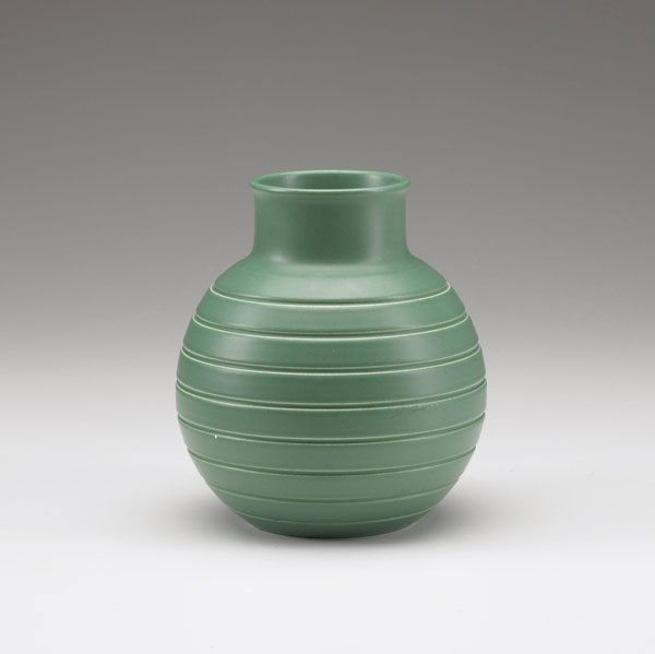KEITH MURRAY / WEDGWOOD Green glazed ceramic vase: KEITH MURRAY / WEDGWOOD Green glazed ceramic vase. Stamped Keith Murray Wedgwood Made in England Matt Green. 6 1/2'' x 5''