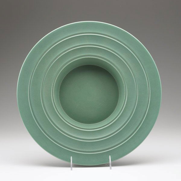 KEITH MURRAY / WEDGWOOD Green glazed dish: KEITH MURRAY / WEDGWOOD Green glazed dish with wide rim. Stamped Keith Murray Wedgwood Made in England. 2'' x 14''