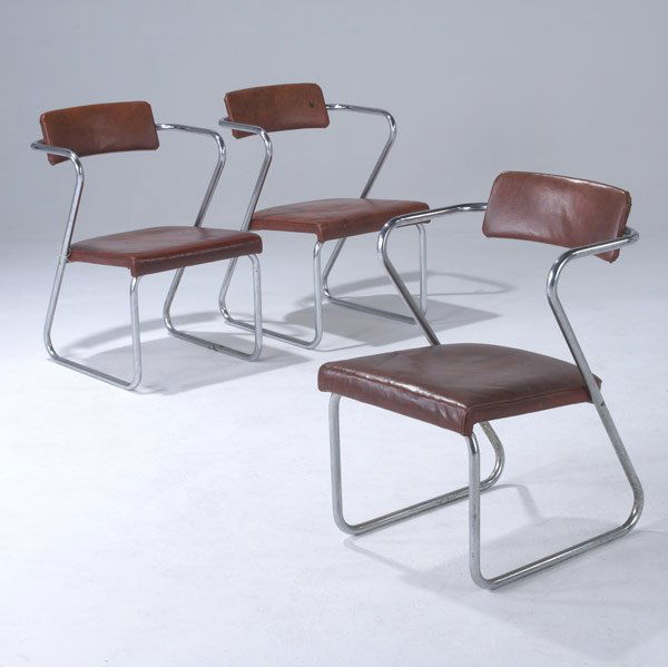 GILBERT ROHDE / TROY SUNSHADE Three ''Z'' chairs: GILBERT ROHDE / TROY SUNSHADE Three ''Z'' chairs with red vinyl cushions on bent tubular steel frames. 30'' x 21'' x 21 1/4''