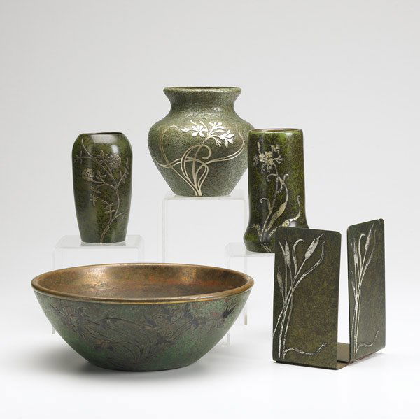 HEINTZ STERLING ON BRONZE/SILVERCREST Six items: HEINTZ STERLING ON BRONZE/SILVERCREST Six items: three vases, two bowls, and a pair of bookends. Good patinas. Bowl unmarked. Tallest: 5 1/2''