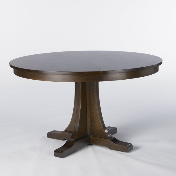 STICKLEY / E.J. AUDI Reproduction split pedestal: STICKLEY / E.J. AUDI Reproduction split pedestal dining table with corseted base and shoe feet, complete with three 15'' leaves. Table, closed: 30'' x 50'' dia.