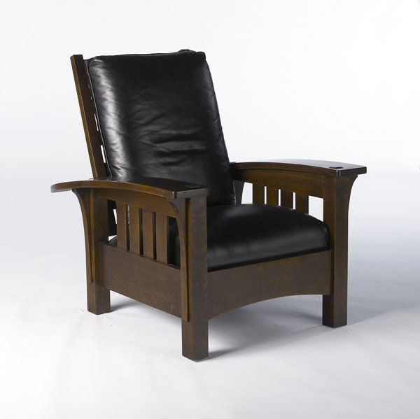 STICKLEY / E.J. AUDI: STICKLEY / E.J. AUDI Reproduction bow-arm Morris chair with slatted sides, long underarm corbels and leather upholstery. 39 1/2'' x 34 1/2'' x 41''