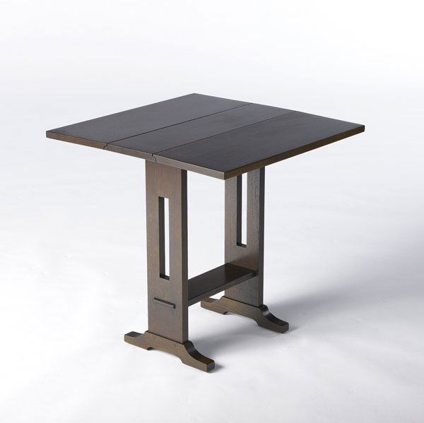 STICKLEY / E.J. AUDI: STICKLEY / E.J. AUDI Reproduction drop-leaf side table with cut-out slat sides and shoe feet. Open dimensions: 24 1/2'' x 24'' sq.