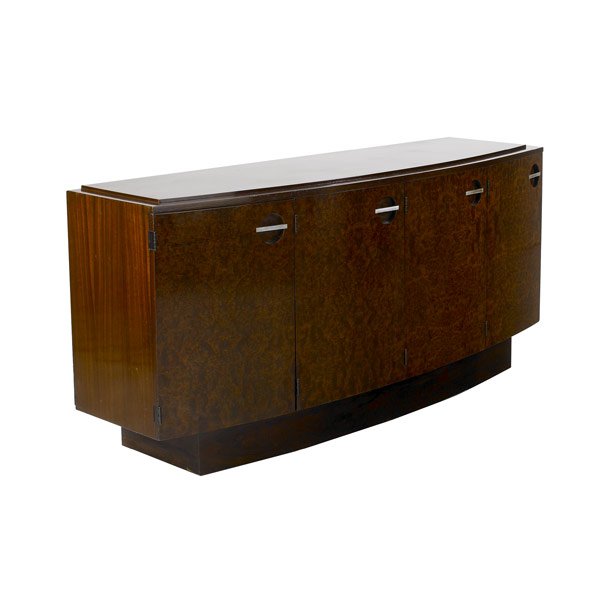 GILBERT ROHDE Four-door sideboard: GILBERT RHODE / HERMAN MILLER Mahogany, burled walnut and rosewood four-door sideboard with steel pulls, with interior divided sliding shelves lined in cork and felt. 33'' x 72'' x 21''