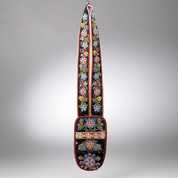 CHIPPEWA BEADED SHOT POUCH: CHIPPEWA BEADED SHOT POUCH, GREAT LAKES Overall floral design on black cotton, wool backing, geometric glass bead border, late 19th c. (Provenance: Private collection, East Coast). Fair condition, a f