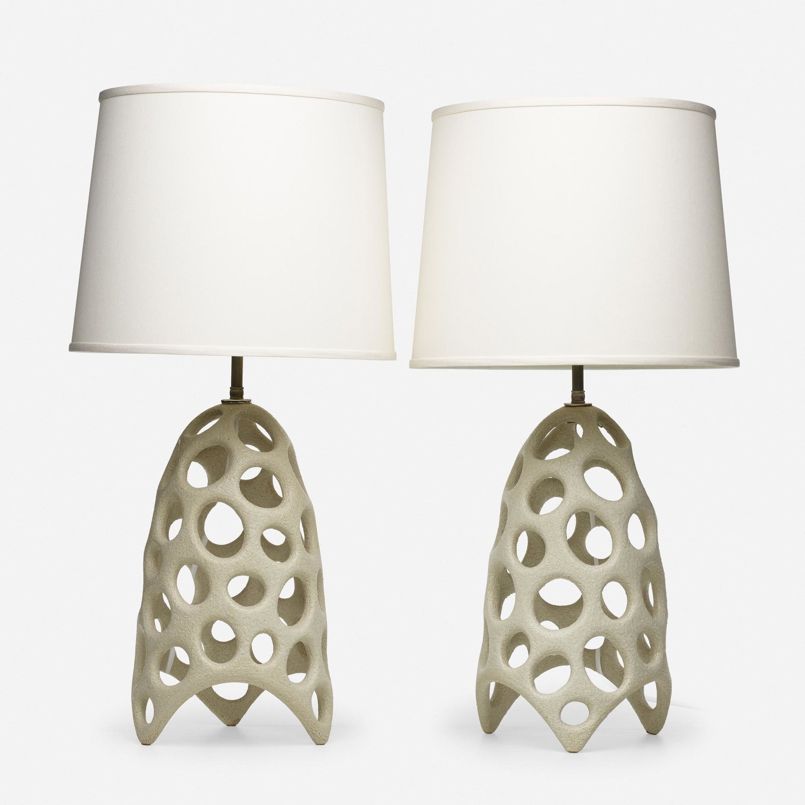 Pamela Sunday, unique Cellular lamps, pair: Pamela Sunday unique Cellular lamps, pair USA, c. 2010glazed earthenware, patinated metal27.75 h × 13.75 dia in (70 × 35 cm) Inspired by nature and science, the artist meticulously ha