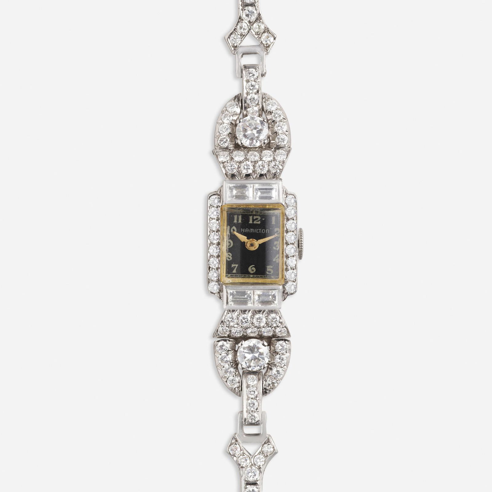 Hamilton, Art Deco platinum wristwatch: Hamilton Art Deco platinum wristwatch The black dial, in a baguette and round brilliant-cut bezel, joined by a diamond band Platinum Case 20 x 14 mm Manual wind, 17 Jewels Dial and movement signed <