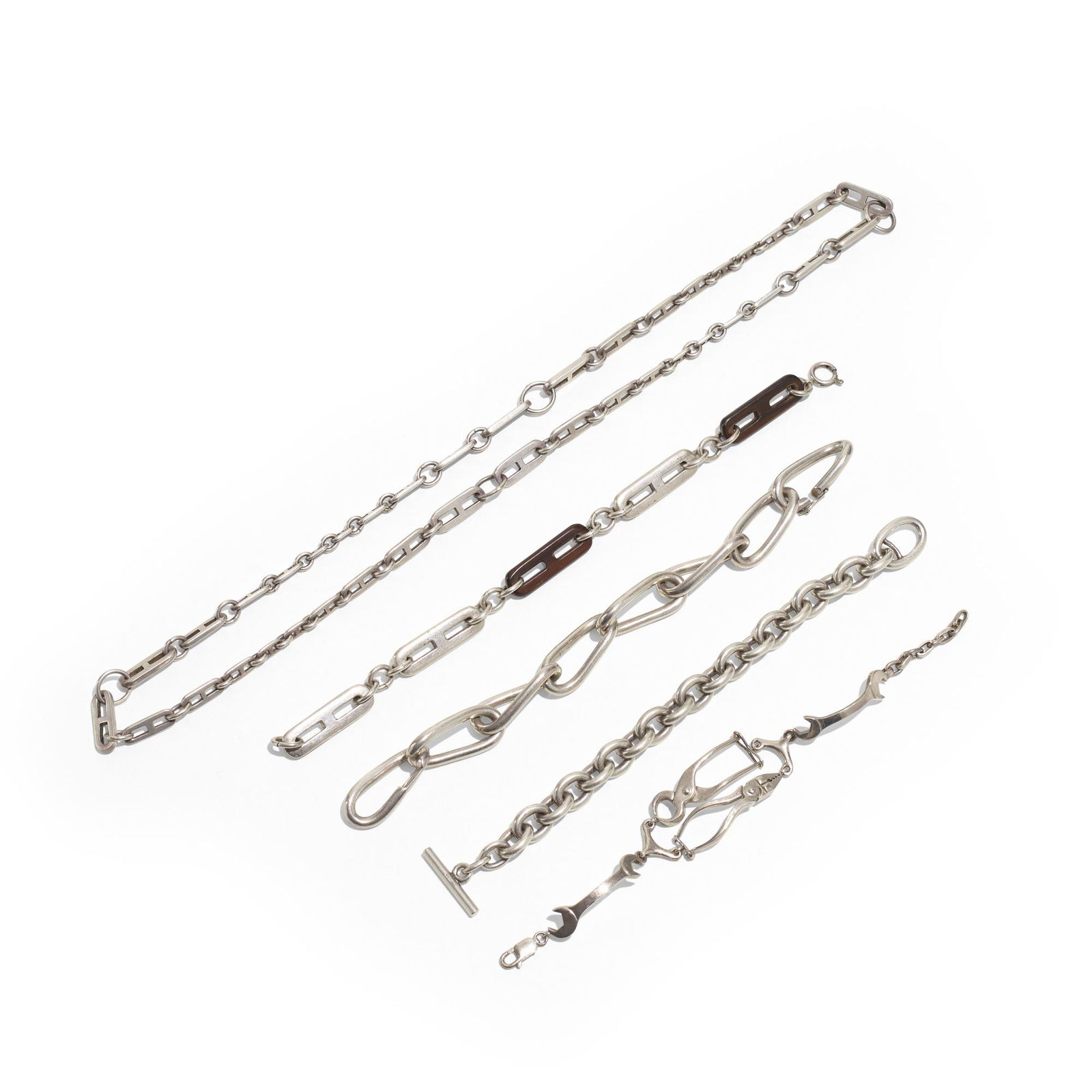 Gucci, Collection of jewelry: Gucci Collection of jewelry Italysterling silver, rosewood, silver.5 w × .5 d × 9 l in (1 × 1 × 23 cm) Lot is comprised of three link bracelets, one vintage rosewood and s